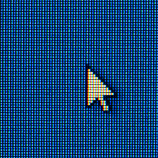 A close up view of an arrow on a computer screen