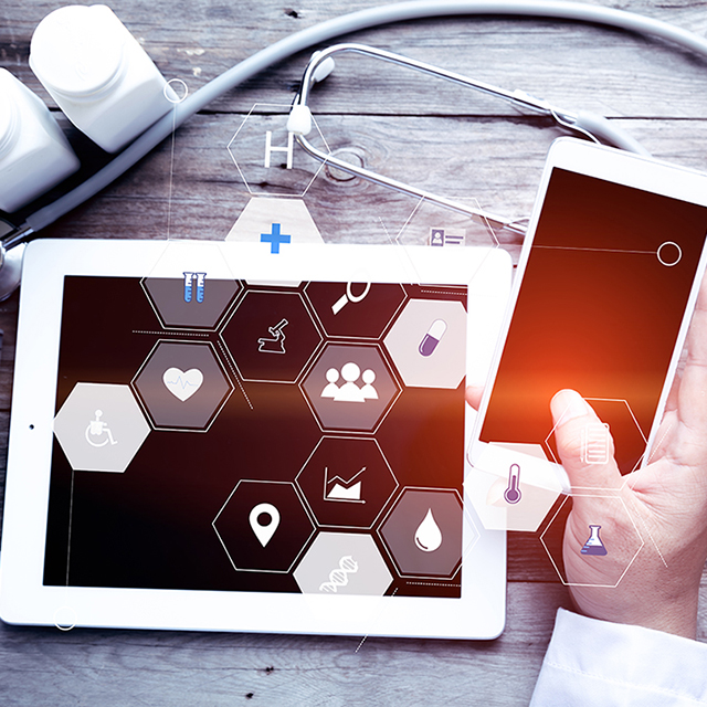 Photoillustration of a smartphone, tablet and medical supplies