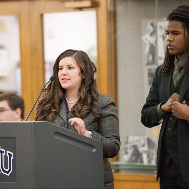 Students engage in a debate competition