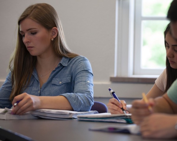 Students working on creative writing assignments