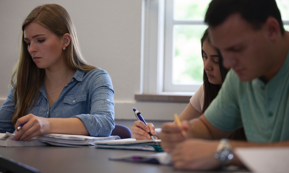 Students working on a creative writing assignment