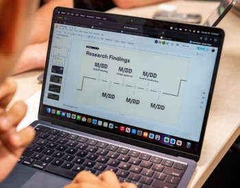 student looking at computer screen