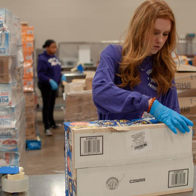 Photo of students volunteering at a Food Bank